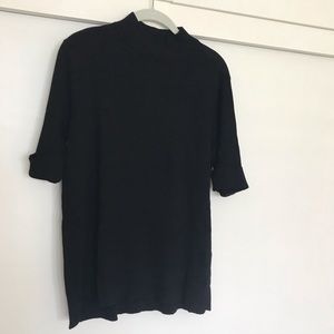 Chicos short sleeve mock turtleneck.